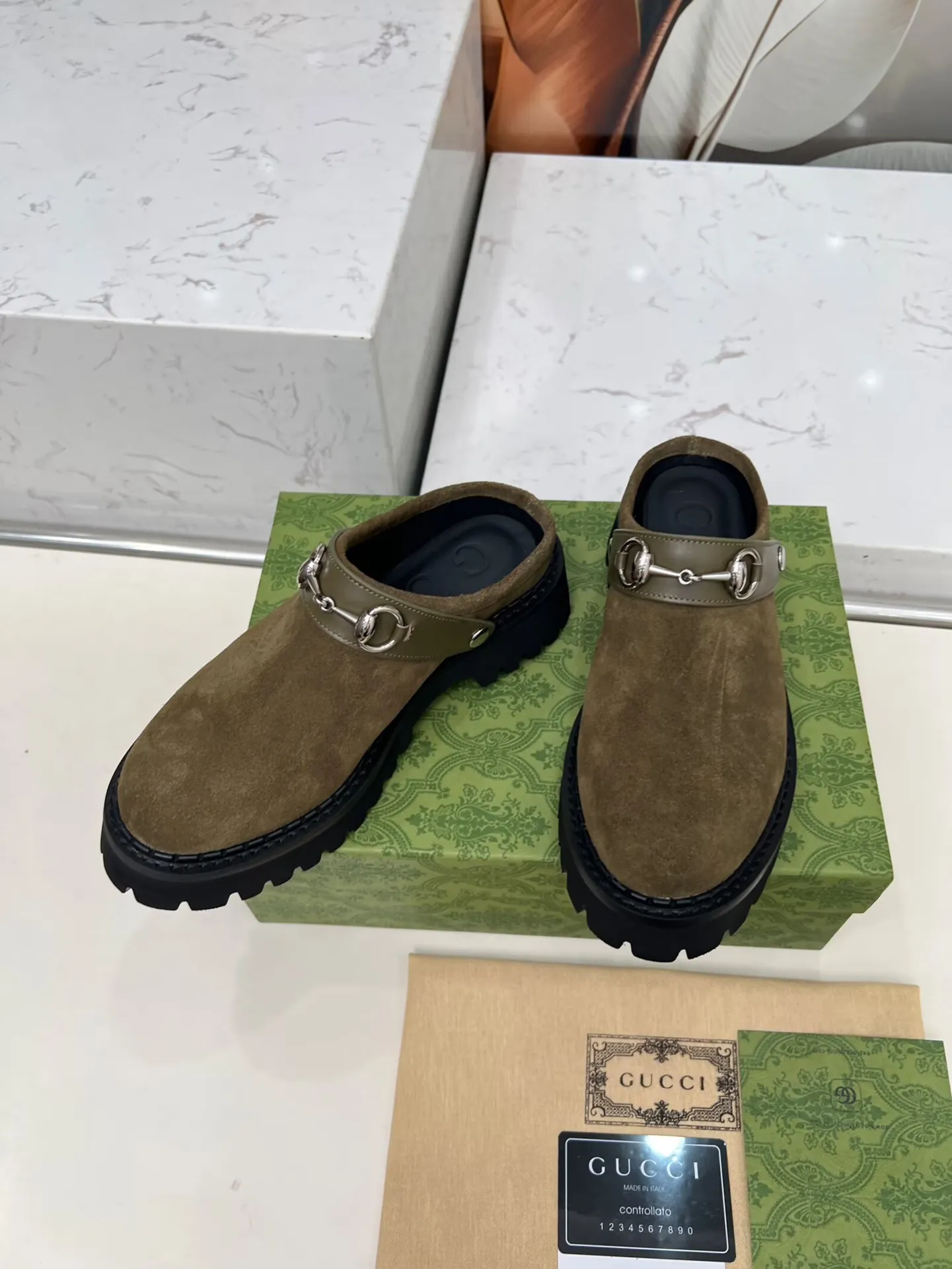 👟👟Ex-factory price 480👟👟 GUCCI British-style fashion slippers, lazy design back stumbling ➕thick sole increased height, empty back shape looming with exposed ankles, super cool when walking, age-neutral style, wide audience, Fabric: cowhide, mercerized cow suede Lining/foot pad: cowhide Outsole: foam outsole Heel height: 5cm Number of yards: 35-42 (customized numbers at both ends) Color: 4 colors available: black, brown, and military green Packing: card, bag
